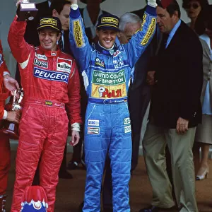 1994 Monaco Grand Prix. Monte Carlo, Monaco.12th - 15th May 1994. Martin Brundle (McLaren MP4/9-Peugeot), 2nd position, with Michael Schumacher (Benetton B194B-Ford), 1st position, podium, portrait. World Copyright: LAT Photographic