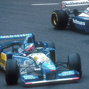 1995 Belgian Grand Prix. Spa-Francorchamps, Belgium. 25-27 August 1995. Damon Hill (Williams FW17 Renault) battles with Michael Schumacher (Benetton B195 Renault). Ref-95 BEL 10. World Copyright - LAT Photographic