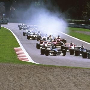 1996 Italian Grand Prix: Jean Alesi leads Damon Hill and Jacques Villeneuve into the Roggia Chicane at the start