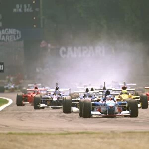1997 Italian Grand Prix: Polesitter Jean Alesi leads the field at the start