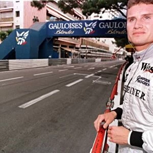 1998 MONACO GP. David Coulthard, McLaren Mercedes, surveys the start / finish straight