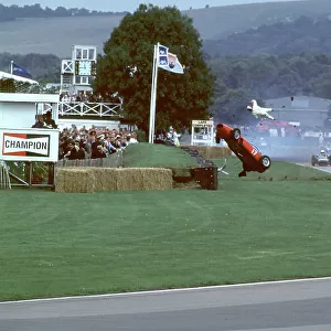 2000 Goodwood Motor Circuit Revival. Goodwood, England. 15th - 17th September 2000. Nigel Corner is catapulted out of his Ferrari Dino at the start of the race, action. World Copyright: Jeff Bloxham / LAT Photographic. Ref: FoS11