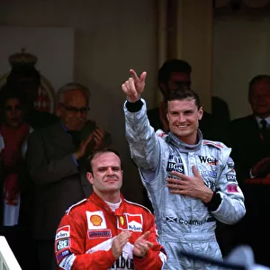 2000 Monaco Grand Prix. RACE Monte Carlo, Monaco, 4/6/2000 David Coulthard, McLaren Mercedes salutes the crowd after winning the Monaco GP. With Rubens Barrichello 2nd and Giancarlo Fisichella 3rd. World Tee/LAT Photographic Podium/Celebration