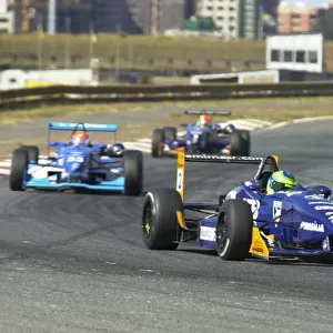 2001 South American Formula 3 Championship Brasilia, Brazil. 5th August 2001. Juliano Moro (Dallara-Mugen F301), 1st leads Nelson Angelo Piquet, 2nd and Thiago Medeiros. Race action. World Copyright: LAT Photographic. ref: Digital Image Only