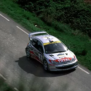 2001 World Rally Championship Catalunya Rally, Spain. 22nd - 25th March 2001. Didier Auriol / D. Giraudet, Peugeot 206 WRC - action. World Copyright: McKlein / LAT Photographic ref: 35mm Image A03