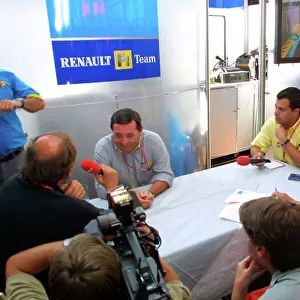 2002 French Grand Prix - Saturday Qualifying Renault boss Patrick Faure announces 2003 driver line up of Fernando Alonso and Jarno Trulli. Also, Flavio Briatore has had his contract extended until 2005