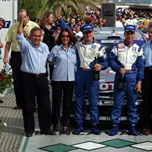 2002 World Rally Championship. Rallye d'Italia, 20-22 September. Sanremo, Italy. The Peugeot team celebrate on the podium Photo: Ralph Hardwick/LAT
