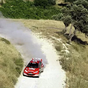 2003 FIA World Rally Champs. Round seven, Cyprus Rally, 19th-22nd June 2003. Harri Rovanpera, Peugeot, action