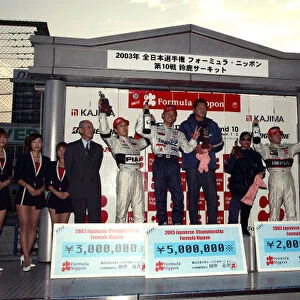 2003 Formula Nippon Championship Suzuka, Japan. 2nd November 2003. Race podium - Juichi Wakisaka (1st), Takashi Kogure (2nd) and Satoshi Motoyama (3rd). World Copyright: Yasushi Ishihara / LAT Photographic ref: Digital Image Only