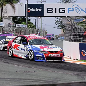 2004 Australian V8 Supercars Surfers Paradise, Australia. 21st - 24th October 2004 Race 2 winner Greg Murphy (Holden Commodore VY), leads Craig Lowndes (Ford Falcon BA), action