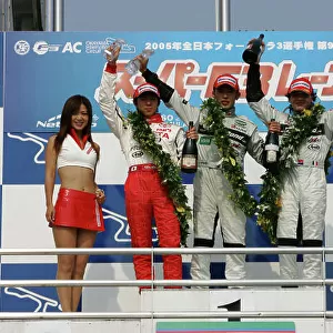 2005 Japanese Formula 3 Championship Okayama, Japan. 19th June 2005 Round 10 podium - winner Naoki Yokomizo (ThreeBond), 1st, Daisuke Ikeda (TOM's) 2nd and Paolo Montin (ThreeBond) 3rd