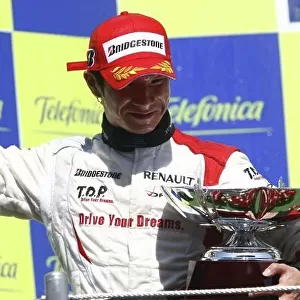 2008 GP2 Series. Round 1. Sunday Race. Barcelona, Spain. 27th April 2008 Kamui Kobayashi (JPN, Dams) celebrates victory on the podium. World Copyright: Andrew Ferraro/GP2 Series Media Service. ref:__H0Y2537. jpg