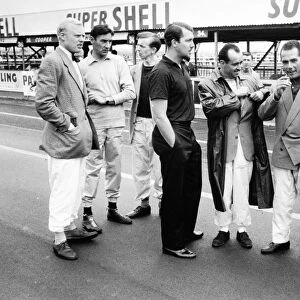 Aintree, Great Britain. 20 July 1957: Left-to-right: Mike Hawthorn, Lancia-Ferrari D50, 3rd position, Roy Salvadori, Cooper T43-Climax, 5th position