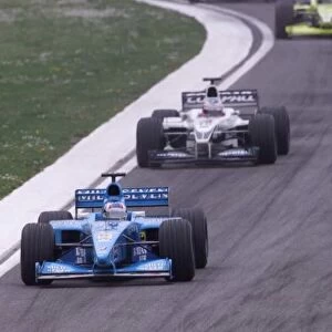 Alex Wurz leads Jenson Button
