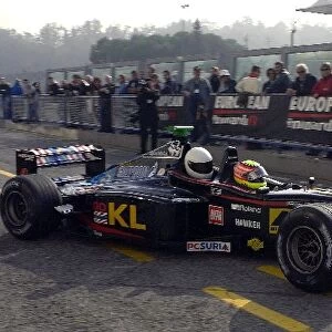 Annual Minardi Day Celebration: Alex Yoong takes a fan out in the Minardi F1x2 2-seater