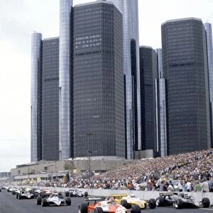 Detroit, United States. 4-6 June 1982: The start with Bruno Giacomelli, Nigel Mansell and Manfred Winkelhock to the fore in the midfield