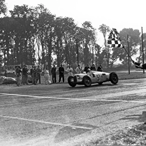Donington Park, Great Britain. 2 October 1937: Bernd Rosemeyer, 1st position at the finish