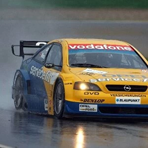 DTM Championship: Alain Menu, Opel Astra Coupe, started the sunday promising by being fastest during the extreme wet warm up session