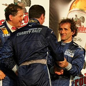 DTM Race of the Legends, Norisring: Podium, Nigel Mansell, congratulates Alain Prost, with his victory. Far left: Jody Scheckter. DTM Race of the Legends