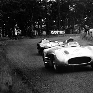 Dundrod, Great Britain. 17 September 1955: Juan Manuel Fangio / Karl Kling, 2nd position, leads Mike Hawthorn / Desmond Titterington, action
