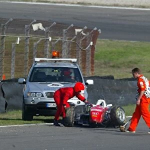 Formula 3 Euroseries: DMSB officials drag the car of Simon Abadie, LD Autosport, Dallara-Mugen off the track after his big accident