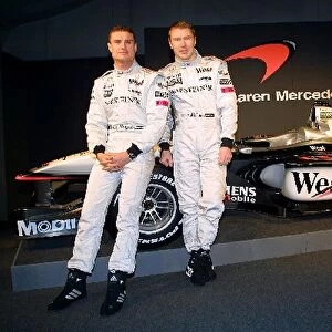 Formula One Launch: David Coulthard and Mika Hakkinen pose with the new 2001 McLaren