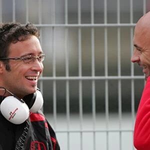 Formula One Testing: Andreas Zuber Honda talks with a Bridgestone technician