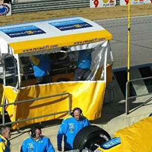 Formula One Testing: The car of Fernando Alonso Renault R25 is returned to the pits on a truck