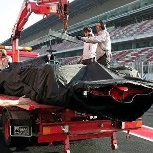 Formula One Testing: The car of Heikki Kovalainen McLaren Mercedes MP4 / 23 is recovered after breaking down on track