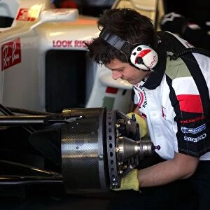 Formula One Testing: A Honda Racing F1 Team mechanic hard at work