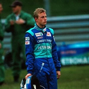 Formula One Testing: Kimi Raikkonen Sauber Petronas C20 walks back to the pits