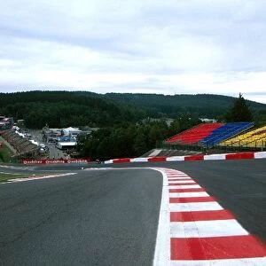 Formula One World Championship: The awesome Eau Rouge corner at Spa Francorchamps, looking down the hill