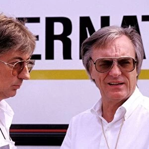 Formula One World Championship: Bernie Ecclestone, FOM President, right, with Herbie Blash, Brabham team manager, left