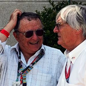 Formula One World Championship: Bob Labelle formerly of Goodyear tyres and F1 Consultant talks with Bernie Ecclestone F1 Supremo