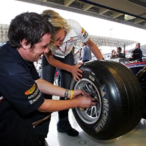 Formula One World Championship: Britta Roeske Practices a wheel change