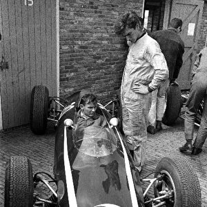 Formula One World Championship: Bruce McLaren sits in the Cooper T66. He retired early in the race with gearbox failure