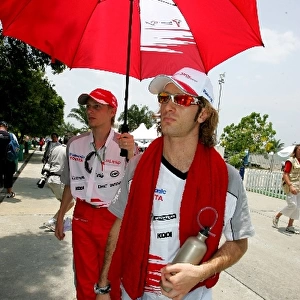 Formula One World Championship: Chris Hughes and Jarno Trulli Toyota during the drivers parade