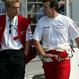 Formula One World Championship: Chris Hughes Toyota Communications Co-Ordinator with Olivier Panis Toyota