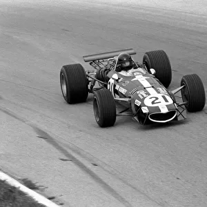 Formula One World Championship: Dan Gurney Eagle T1G retired on lap 19 when his car overheated. ├è