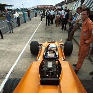 Formula One World Championship: Derek Bell test drives the four wheel drive McLaren M9A. It was raced just once at the forthcoming British Grand Prix