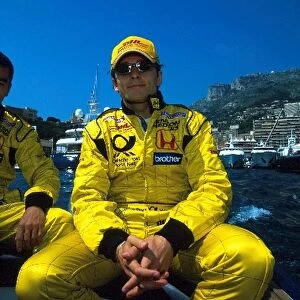 Formula One World Championship: DHL Jordan Honda drivers Takuma Sato and Giancarlo Fisichella relax on a yacht in the Monaco harbour