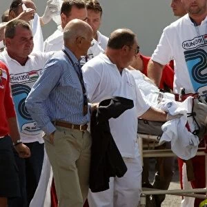 Formula One World Championship: Dudu Massa watches as his brother Felipe Massa Ferrari is airlifted to hospital after a big crash