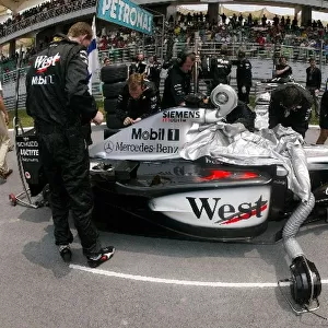 Formula One World Championship: Efforts to keep the Mclaren MP4 / 17 of Kimi Raikkonen cool on the grid proved futile during the race