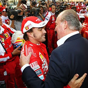 Formula One World Championship: Fernando Alonso Ferrari with King Juan Carlos of Spain on the grid