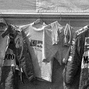 Formula One World Championship: The Ferrari race overalls of Rubens Barrichello and Michael Schumacher are hung up ready to be worn in the race