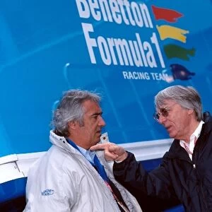 Formula One World Championship: Flavio Briatore Benetton F1 Boss in discussion with Bernie Ecclestone F1 Supremo