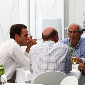 Formula One World Championship: Flavio Briatore talks with Nicholas Clarry, CVC Capital Partners and Donald McKenzie CVC Capital Partners
