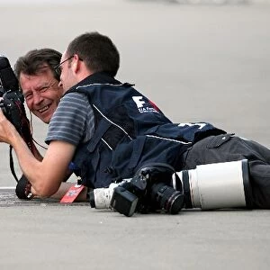 Formula One World Championship: Giero Breloer and Crispin Thruston Photographers