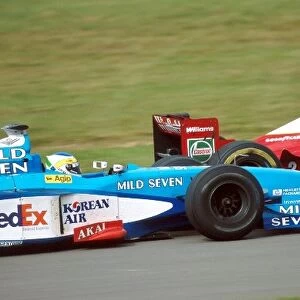 Formula One World Championship: Heinz-Harald Frentzen, Willams FW20, 5th place, passes Giancarlo Fisichella, Benetton B198, 6th place