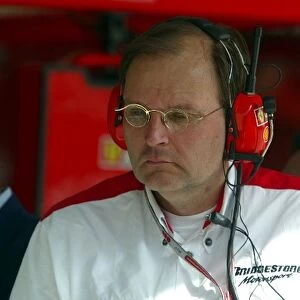 Formula One World Championship: Kees van de Grint Senior Bridgestone Engineer in the Ferrari pit